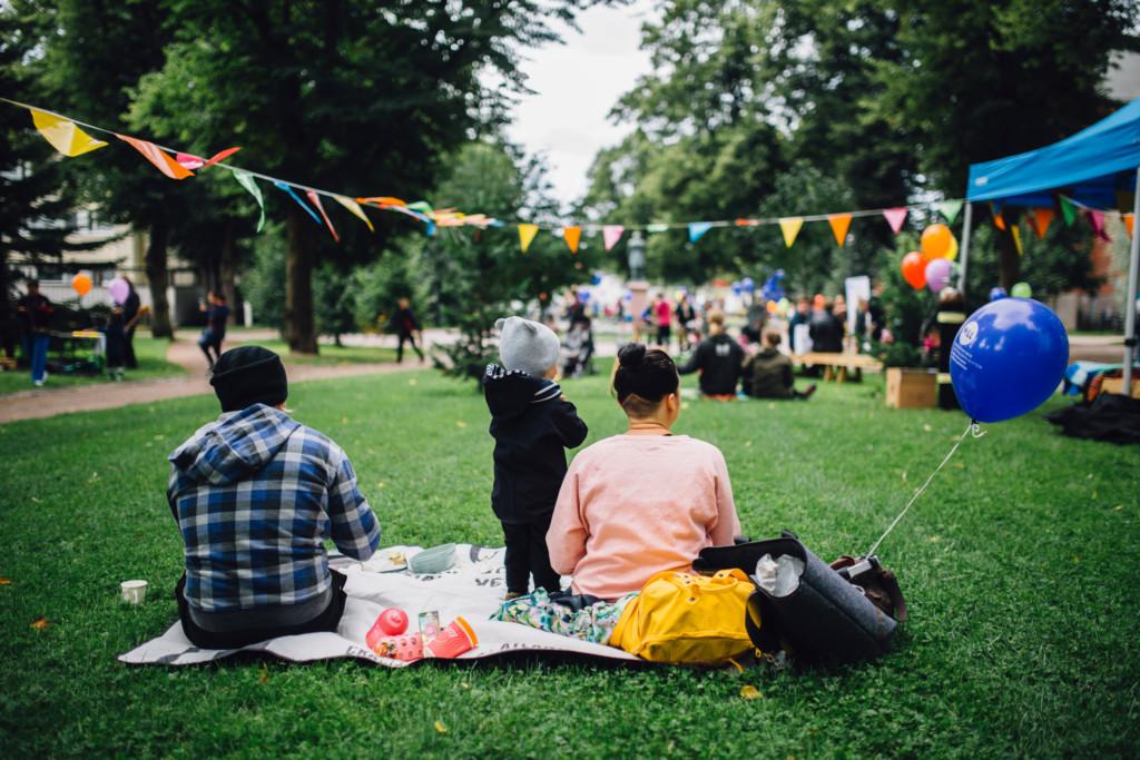 A family in a park event.