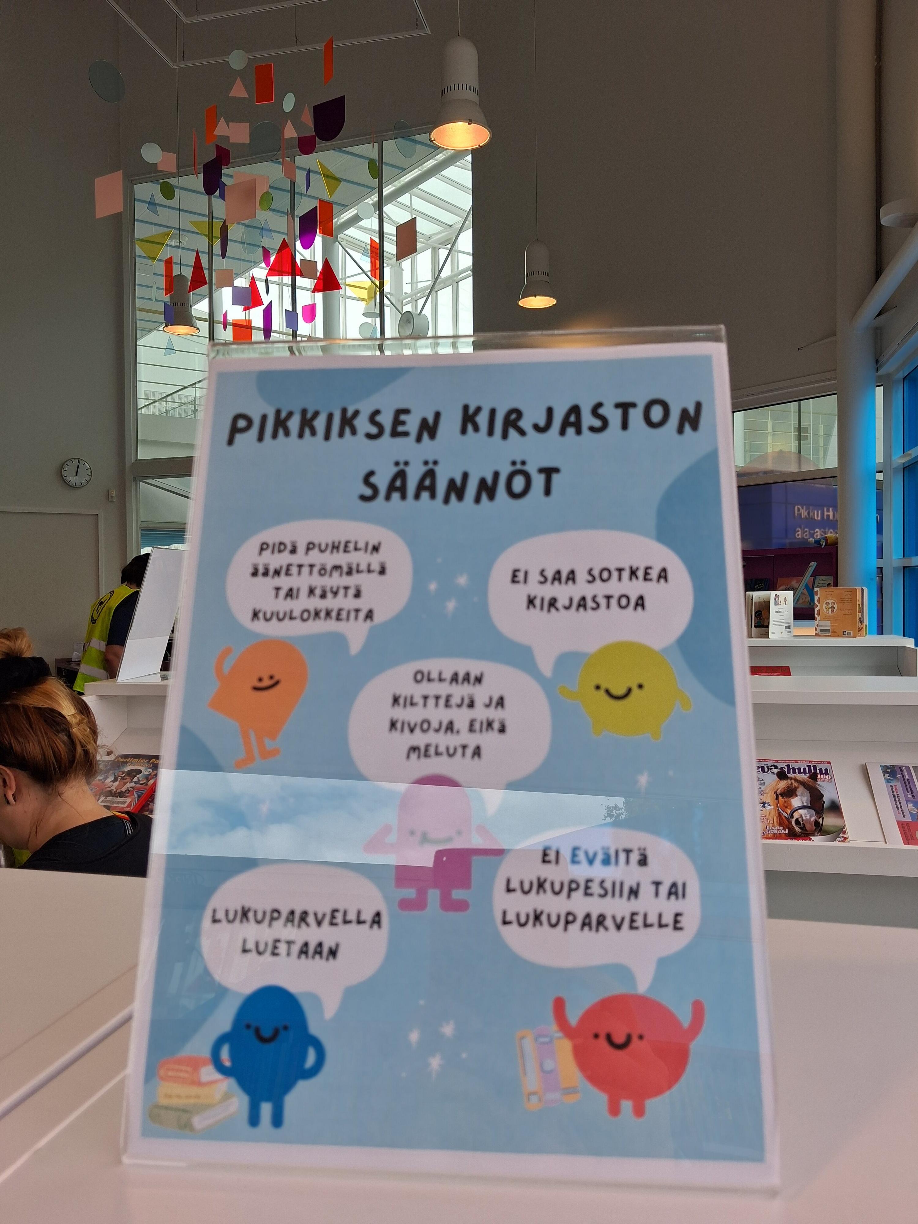 A4, josta voi lukea kirjaston säännöt.