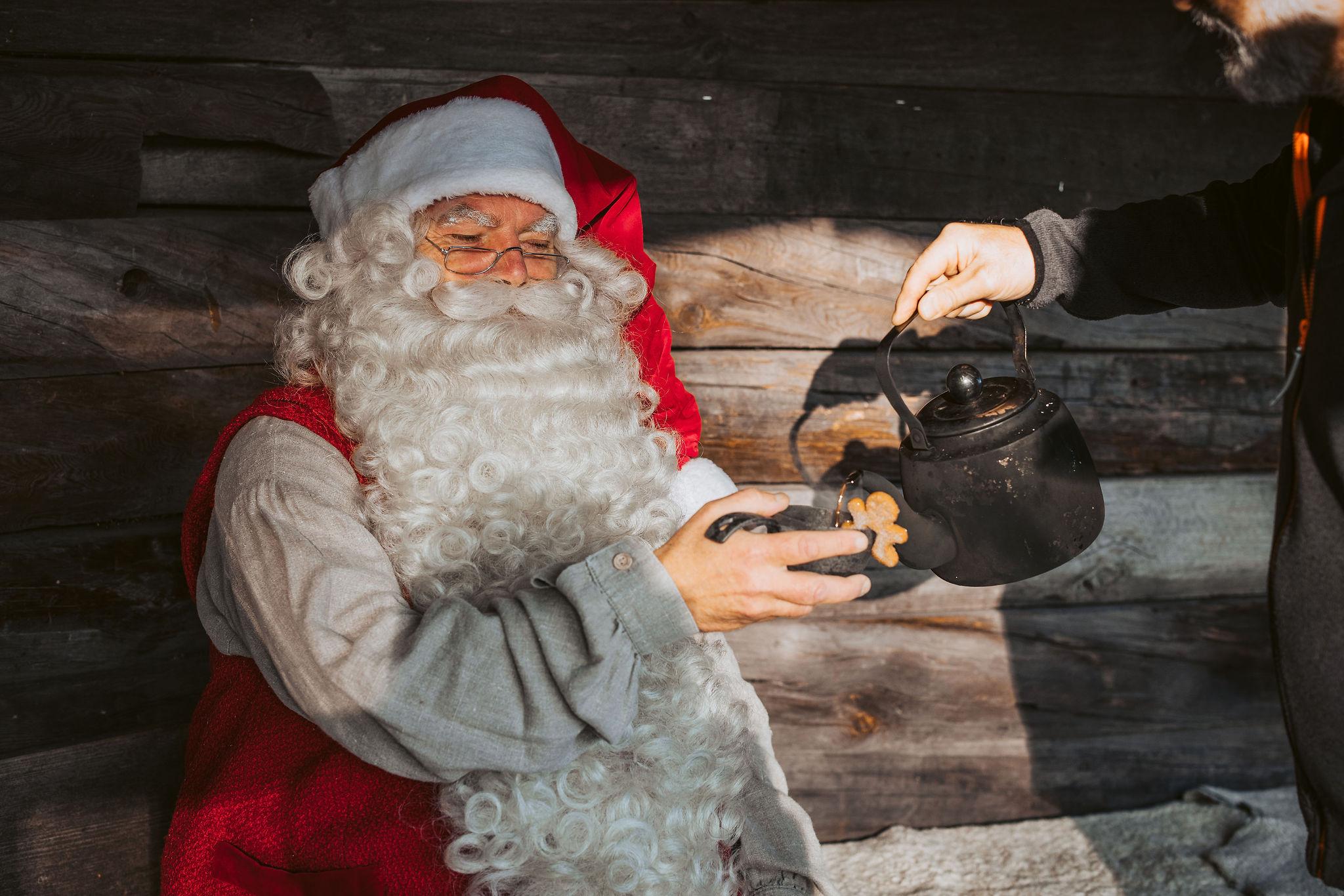 Santa Claus enjoying a cup of coffee