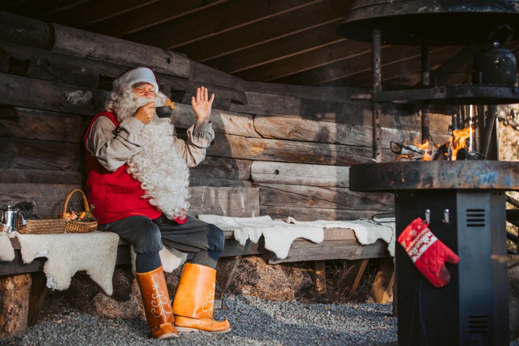 Santa Claus by the open fire
